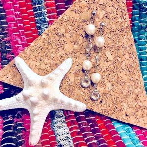 Pearl and diamond dangle earrings